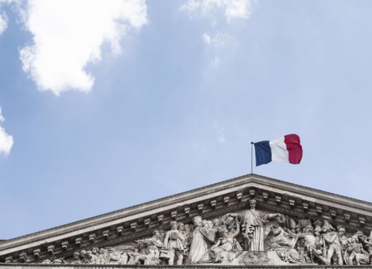 french-flag-on-top-of-building